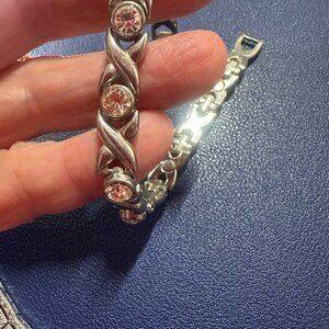 2 Silver Tone Bracelets  (1 Tennis Bracelet + 1 Diamond Cut)
